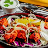 Chicken Tikka Kabab · Boneless breast cubes cooked in clay oven.