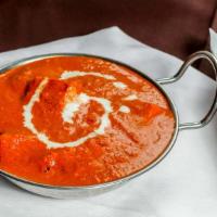 Chicken Tikka Masala · Chicken breast cooked in gravy with cashews, coconut, onion, and spices.