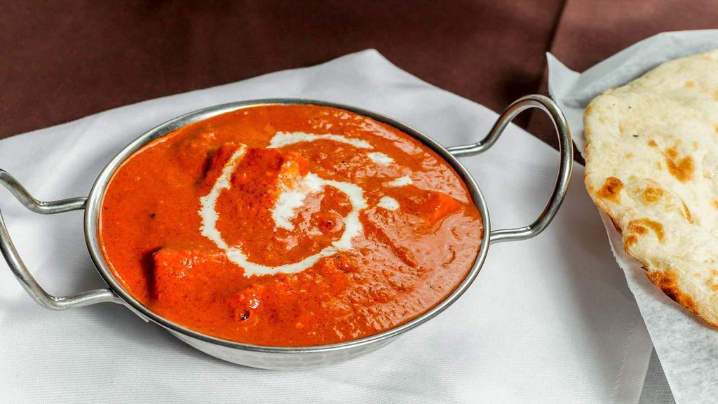 Chicken Tikka Masala · Chicken breast cooked in gravy with cashews, coconut, onion, and spices.