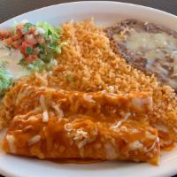 Enchiladas Plate · Your choice of meat in a com tortilla covered with our traditional red enchilada sauce, serv...