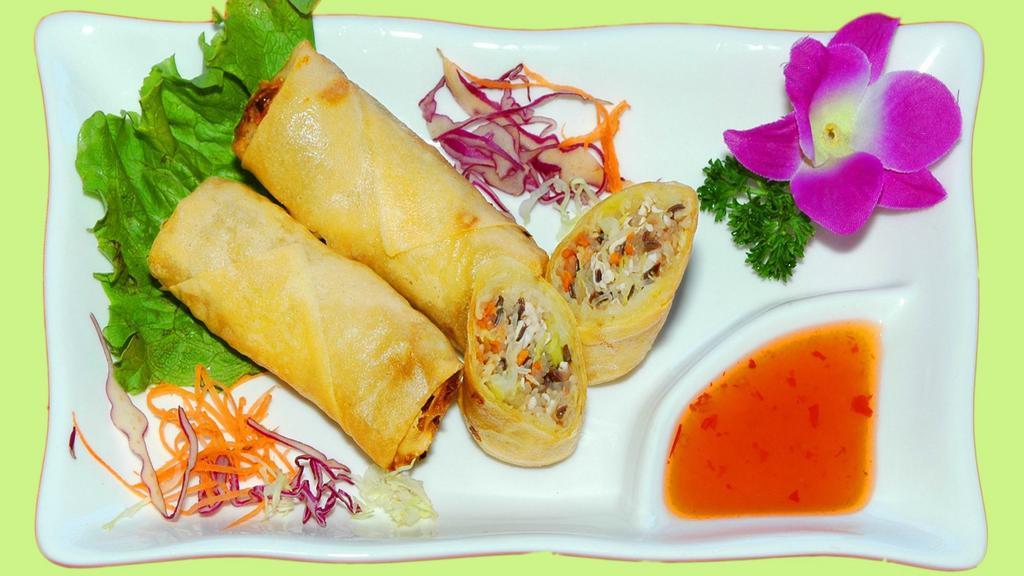 Veg.Spring Roll 春卷 · Fresh seasonal vegetables wrapped in a rice wrapper and fried until golden crisp.
