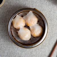 Shrimp Dumpling 蝦餃 · Fresh shrimp wrapped in dumpling skin and steamed to perfection.
