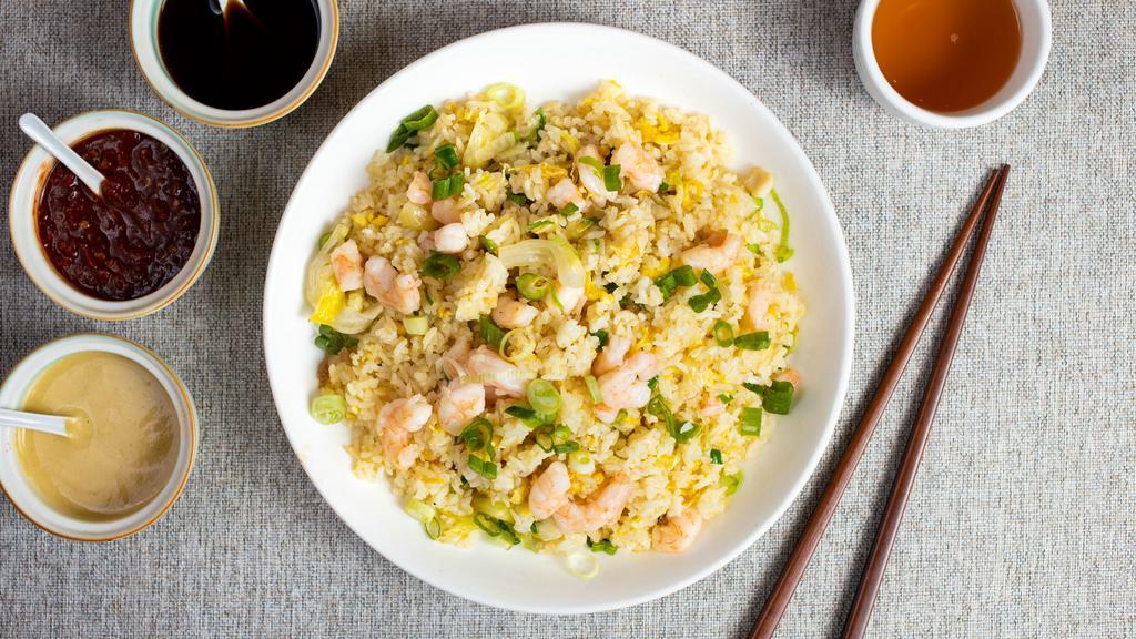A Shrimp Fried this Rice - Shrimp Fried Rice 蝦炒飯 · Fresh shrimp and veggies stir fried and cooked with rice in traditional Chinese spices.