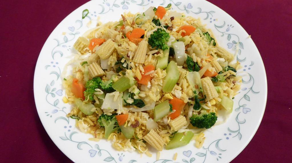A Radish Rice Here - Vegetable Fried Rice 素菜炒飯 · Fresh vegetables cooked and stir fried with rice with rice in traditional Chinese spices.