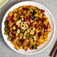Kung Pow - Kung Pao Chicken 宮保雞丁 · Chicken, peanuts, peppers, and chili peppers stir fried in a Sichuan gravy. Garnished with s...
