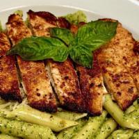 Cajun Pesto Penne · Carved Cajun blackened chicken breast over penne with Parmesan cheese