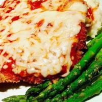 Chicken Parmesan · Breaded Chicken  Parmesan served with a side of Spaghetti with Meat Sauce and Garlic Bread. ...