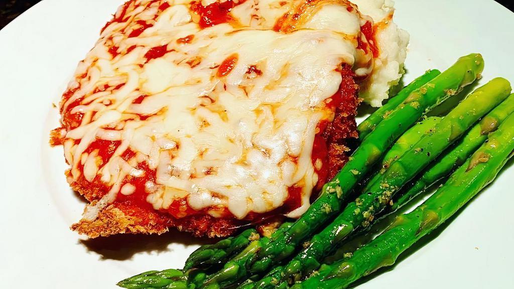 Chicken Parmesan · Breaded Chicken  Parmesan served with a side of Spaghetti with Meat Sauce and Garlic Bread. (No substitutions)