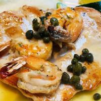 Chicken & Prawn Picatta · Boneless skinless breast of chicken, three prawns, picatta sauce, rice, served with sautéed ...