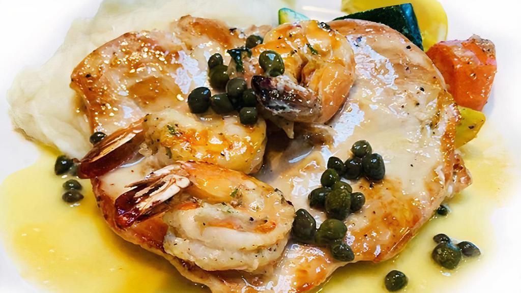 Chicken & Prawn Picatta · Boneless skinless breast of chicken, three prawns, picatta sauce, rice, served with sautéed vegetables.