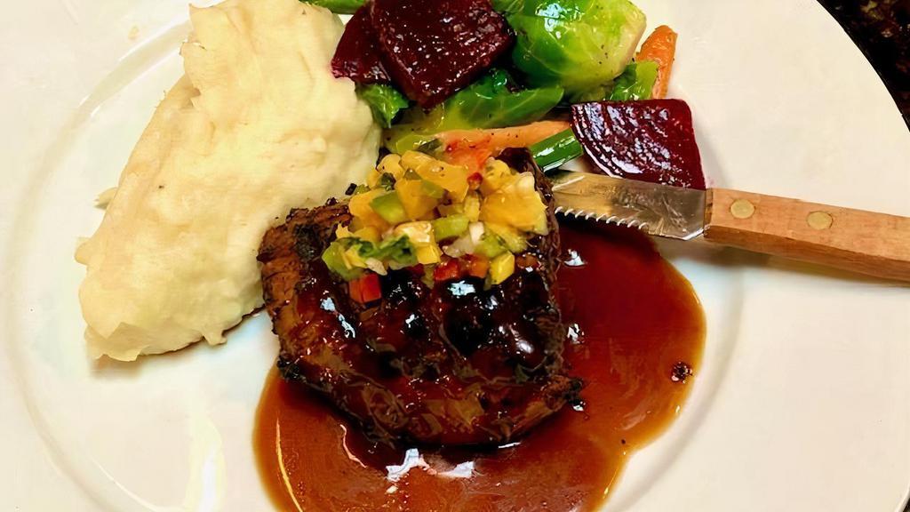 Grilled Bistro Filet · Topped with demi-glace, spicy papaya-jicama salsa served with mashed potatoes, sautéed vegetables.