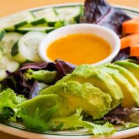 1. Green Salad · Spring mixed, carrot cucumber, avocado served with mango and honey based dressing.