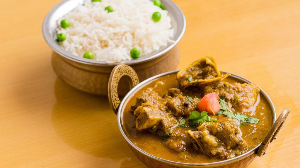 11. Goat Curry · Bone-in goat meat cooked in authentic nepalis style in house special sauce, herbs, and spices.