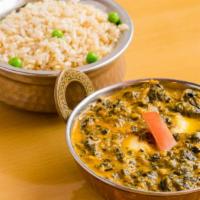 14. Palak (Sagg) Paneer · Minced spinach with fried cheese cubes cooked in a creamy sauce special herb and spices.