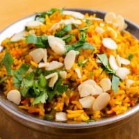 42. Veg Biryani · Seasonal mixed vegetable cooked with basmati rice in a special biryani masala.