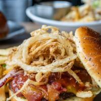 Cowboy Burger · Shoestring onions, bacon, cheddar, and beer barbeque sauce.