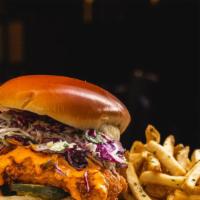 Spicy Fried Chicken Sandwich · Coleslaw / house pickles / firecracker aioli