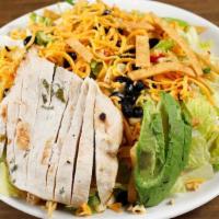 Lime Chicken · Romaine, roasted corn and tomato salsa, black beans, cheddar, tortilla strips, avocado, lime...