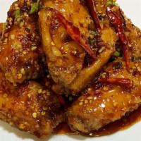 Dry Braised Chicken Wings · Hot and spicy.