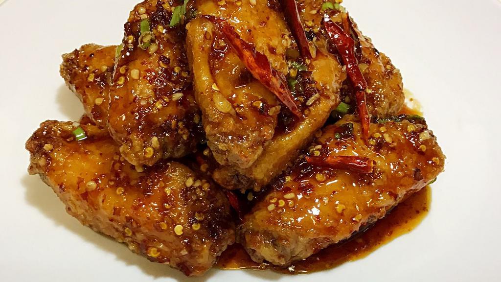 Dry Braised Chicken Wings · Hot and spicy.