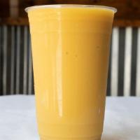 Mango Go Shake Smoothie · Banana, mango, pineapple, protein powder, and milk.
