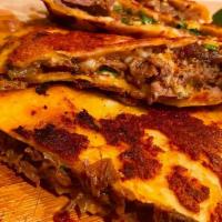 BIRRIA  Quesadilla · Beef short ribs  shredded  with cabbage  red and green and our guajillo mango salsa (not spi...