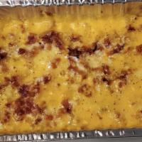 Mac & Cheese with Bacon · New. Homemade mac and cheese with cheddar and mozzarella cheese, topped with bacon and baked...