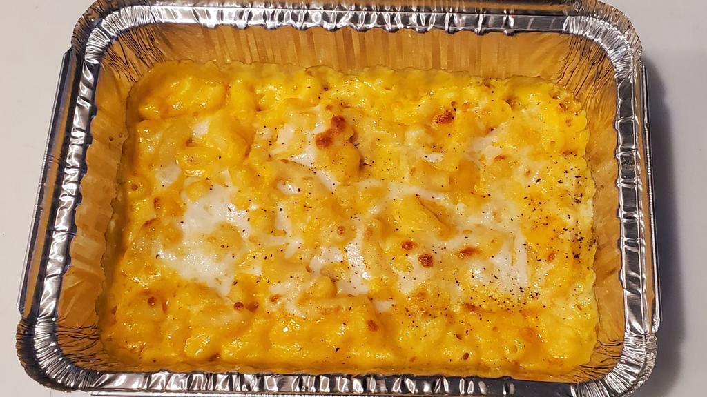 Mac & Cheese · Vegetarian. Homemade mac and cheese with cheddar and mozzarella cheese baked to perfection.