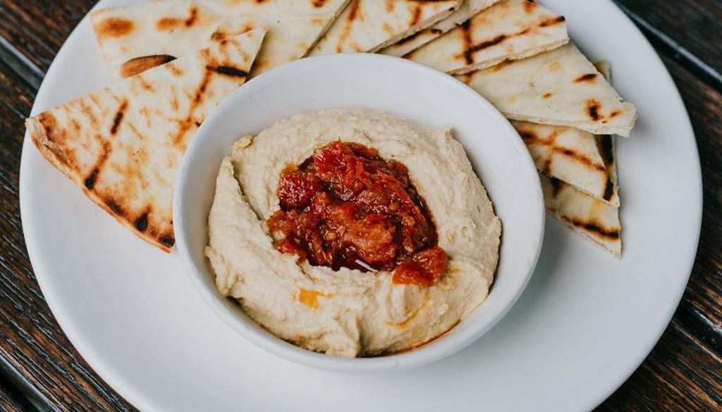 Hummus · House-made hummus served with Grilled Pita