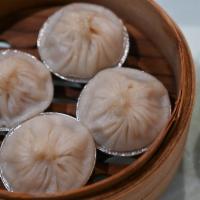 Kurobuta Pork Soup Dumplings · Xiao Long Bao. Four pieces. Served with black vinegar