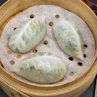 Steamed Vegetable Dumplings · Three pieces.