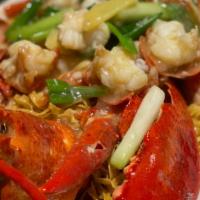 Whole Maine Lobster and Noodles · Lobster sautéed with e-fu noodles in a ginger and scallion sauce