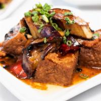 Three Treasures with Black Bean Sauce · Bean curd, eggplant, and hot peppers stuffed with shrimp in a black bean sauce.