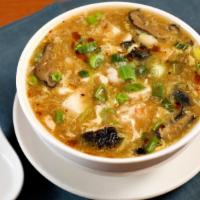 Hot & Sour Soup · A Northern Chinese mixture of shredded chicken, shrimp, julieened shiitake mushrooms, tofu, ...