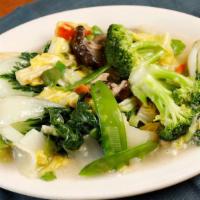 Xiao Loong's Vegetable Garden · Assorted fresh vegetables, stir-fried with chopped scallions, and a light garlic-infused win...