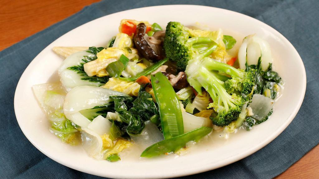 Xiao Loong's Vegetable Garden · Assorted fresh vegetables, stir-fried with chopped scallions, and a light garlic-infused wine sauce.