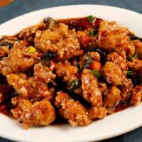 Spicy Dry Fried Chicken · Deep-fried battered chicken chunks tossed with xiao loong's sweet garlic pepper sauce. A ver...