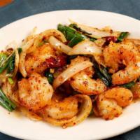 Lemon Pepper Prawns · Prawns stir-fried with sliced yellow onions, minced garlic, and a spicy lemon pepper mixture.