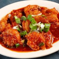 Xiao Loong's Spicy Chili Prawns · Prawns stir-fried with chopped garlic, minced ginger, and our house chili sauce: A delightfu...