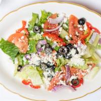 Greek Salad · Romaine lettuce, red onions, black olives, red bell peppers, fresh tomato, feta cheese and p...