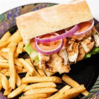 Grilled Chicken Sandwich · Served with mayo, mustard, lettuce, tomato and onion.