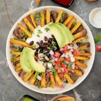 Mexican Sweet Potato Fries · (Vegetarian) Jalapenos, black beans, guacamole, and melted cheese topped on sweet potato fri...