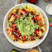 Vegan Mexican Loaded French Fries · (Vegetarian) Cherry tomatoes, black beans, corn, avocado, and cilantro topped on Idaho potat...
