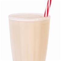 Vanilla Shake · Classic blend of vanilla ice cream and whole milk. Topped with whipped cream.