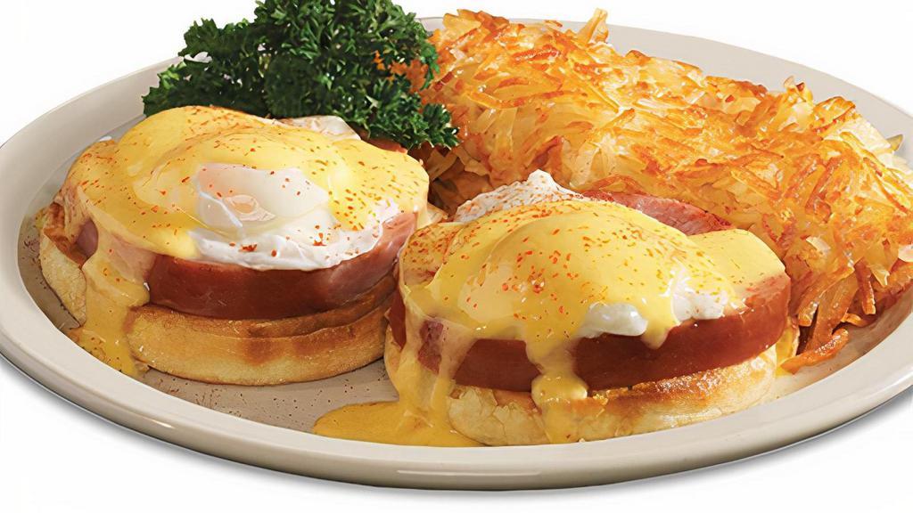 Classic Eggs* Benedict · Two farm-fresh poached eggs* and country-sliced ham set atop an English muffin with creamy hollandaise sauce. Served with a side of crispy golden hash browns..