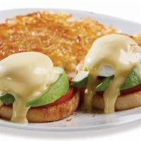 Avocado & Tomato Benedict · The breakfast classic lightens up! We start with two farm-fresh poached eggs*, griddle an En...