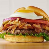 Hangover Burger · Crispy hash browns, Applewood-smoked bacon, lettuce, tomatoes, pickles, red onions, and mayo...
