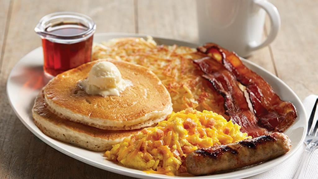 The Shari's Sampler · Two farm-fresh eggs* scrambled with diced country ham and cheddar cheese. Served with Applewood-smoked bacon, grilled sausage and choice of two breakfast sides.