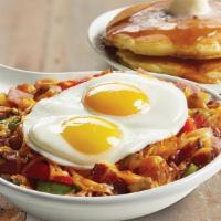 Meat Lover'S Skillet · We start with a generous portion of crispy hash browns, add Applewood-smoked bacon, country ...