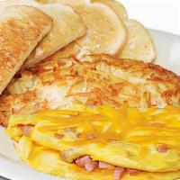 Country Ham & Cheddar Omelette · Taste the cheesy goodness that blends perfectly with the hearty flavor of our country ham. S...